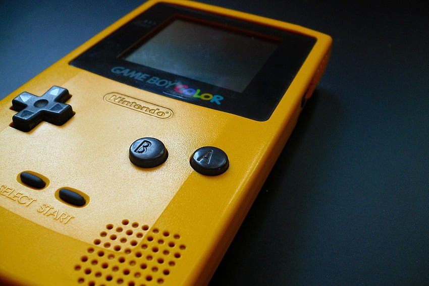 yellow gameboy color game boy color-Game Boy Color : L'histoire et l'évolution-Rabbits Games Game Boy Color, Nintendo, jeux célèbres, version améliorée de la Game Boy originale, rétrogaming,