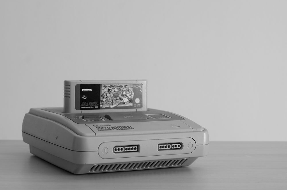 Retour nostalgique sur la console Super Nintendo et son impact durable sur l'industrie du jeu vidéo et la culture pop Retour nostalgique sur la console Super Nintendo et son impact durable sur l'industrie du jeu vidéo et la culture pop, Console Super Nintendo, SNES, jeux rétro, 16-bits, Mode 7